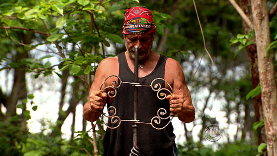 One is an inanimate steel rod. The other is a Survivor contestant. Can YOU tell the difference?