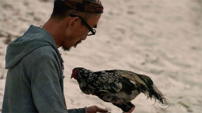 A man and his chicken