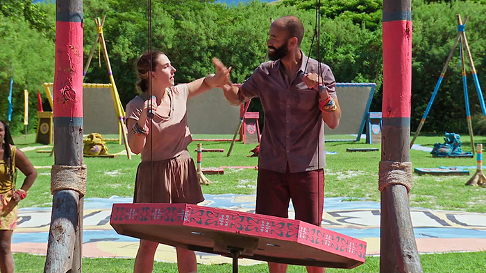Nate and Sophie high-five, mid-table maze Nate and Sophie high-five, mid-table maze